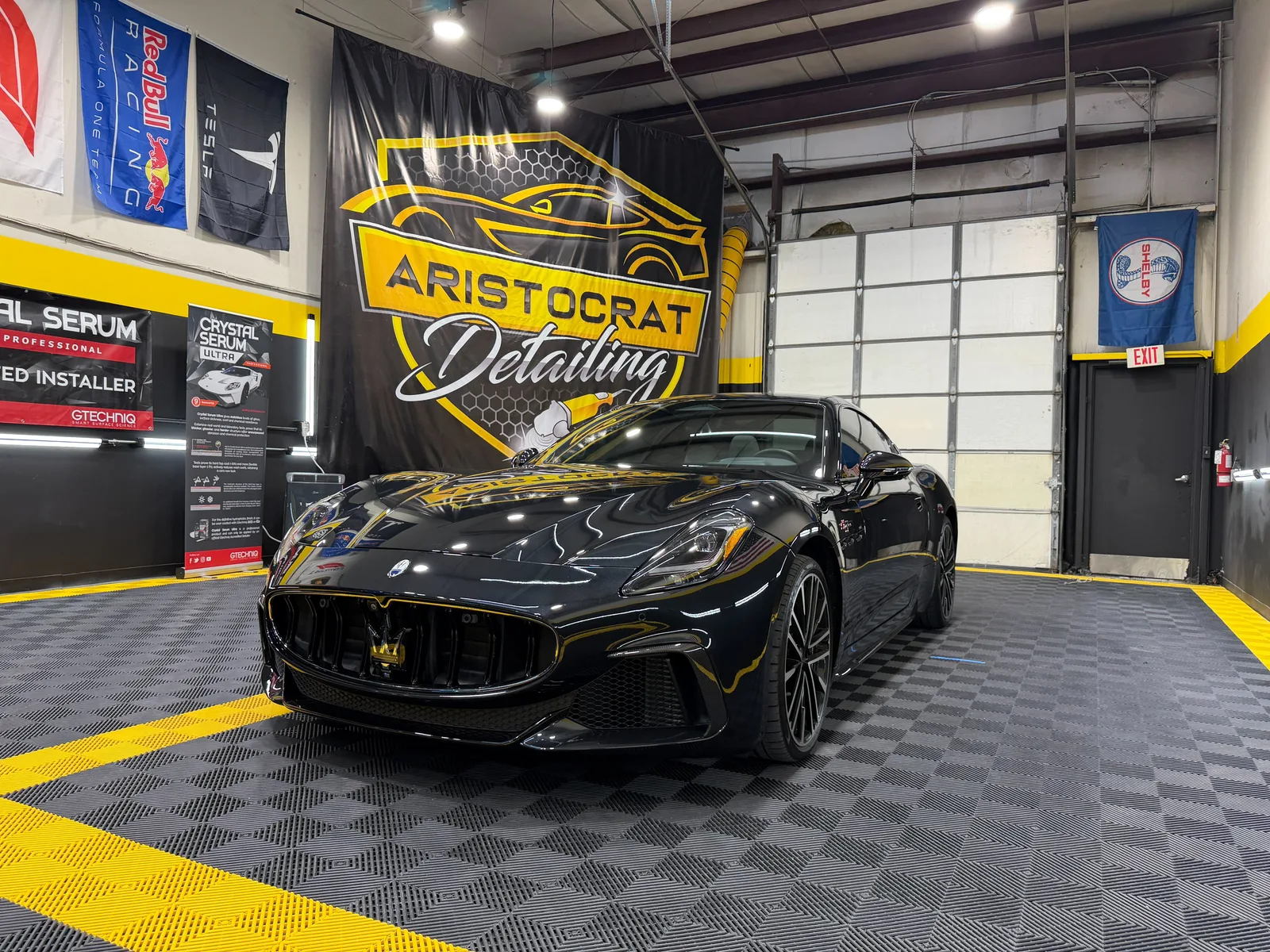 Black Maserati ceramic coating paint correction Lenexa KS